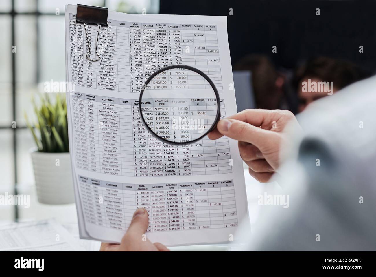 Hand magnifying glass documents hi-res stock photography and images - Alamy