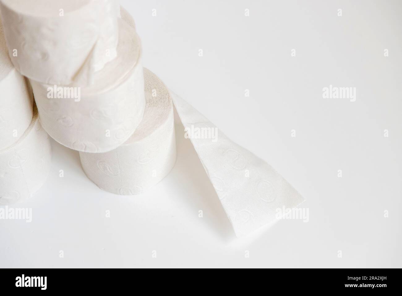 Recycled toilet paper rolls stacked on top of each other. Copy space