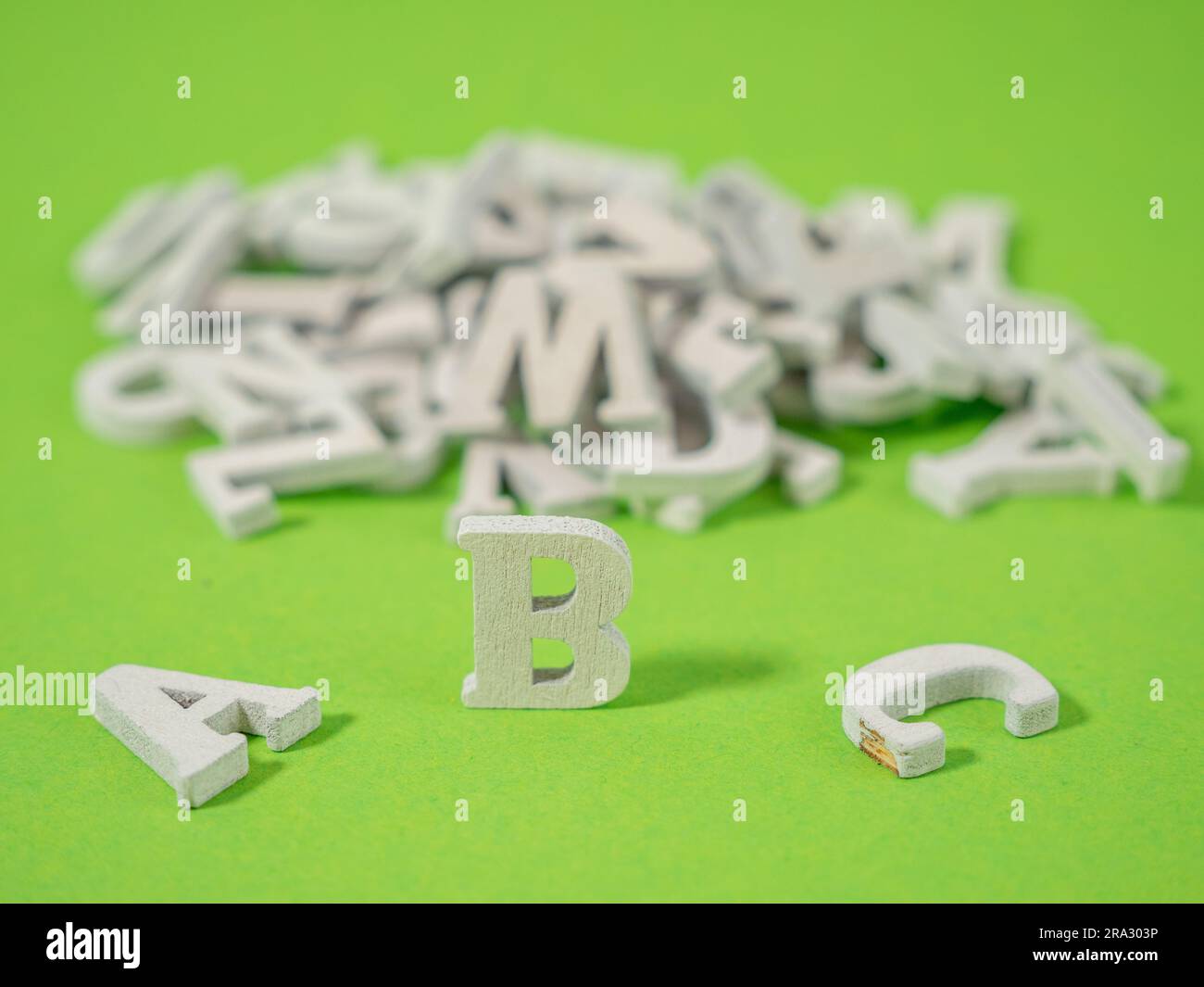 Wooden letters on a green background. Wooden letters abc concept of ...