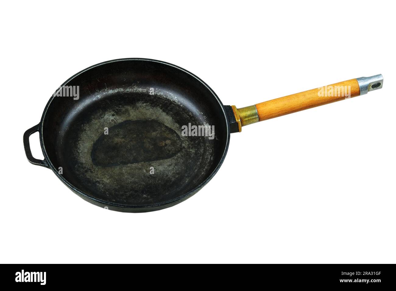 Cast iron pan. Pan was used. Kitchenware isolated on white background. Stock Photo
