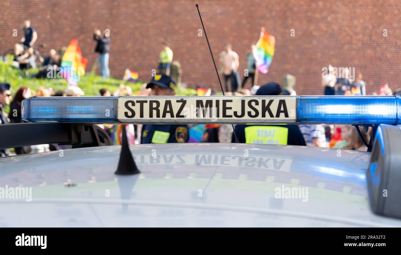 Polish municipal police car lightbar emergency lights. Blue lighting flasher light bar mounted on the roof of patrol vehicle. Straż Miejska in Poland. Stock Photo