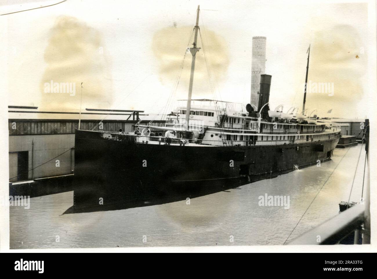 Photograph of the Port View of the SS City of Montgomery. Port View. Date: - July 27 1918. Photograph : - S. S. City Of Montgomery. Nationality: - American. Tonnage: - 5425. Captain: - M. A. Hammond. Owners: - Ocean S.S. Co. Where From: - New York, N. Y. Destination: - New York, N. Y. Where Photographed: - Savannah, GA. Sixth Naval District. By Whom Photographed: - J. B. Dearborn. Date Photographed July 13th., 1918.. 1918-07-13T00:00:00. Stock Photo