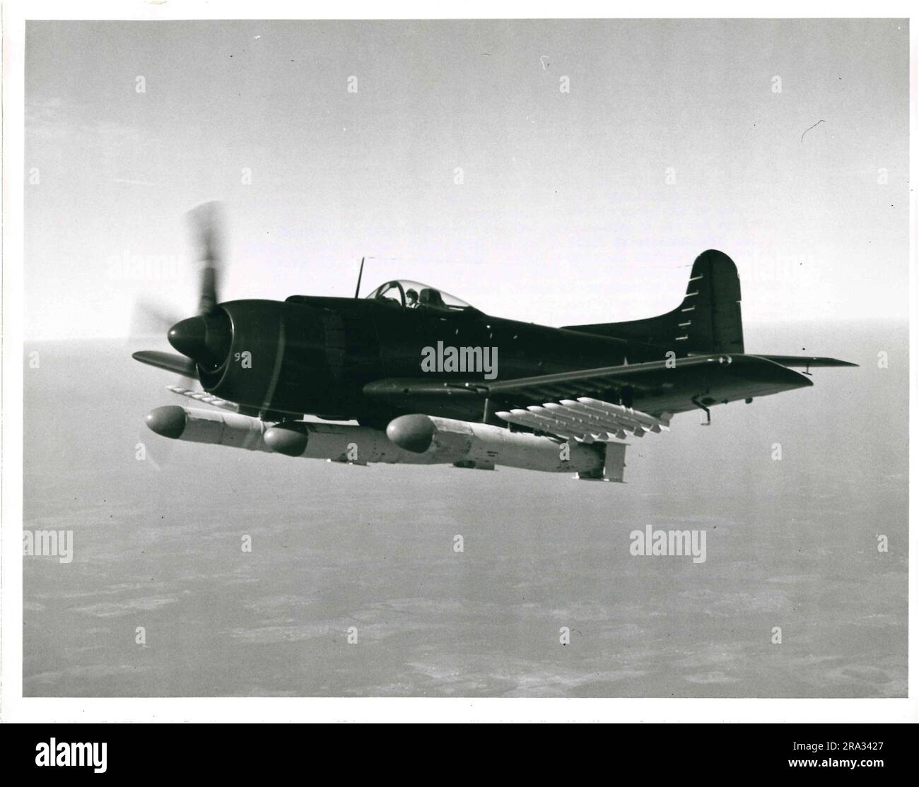 Photograph of Bomb and Missile Laden Martin AM1 Mauler Airplane In