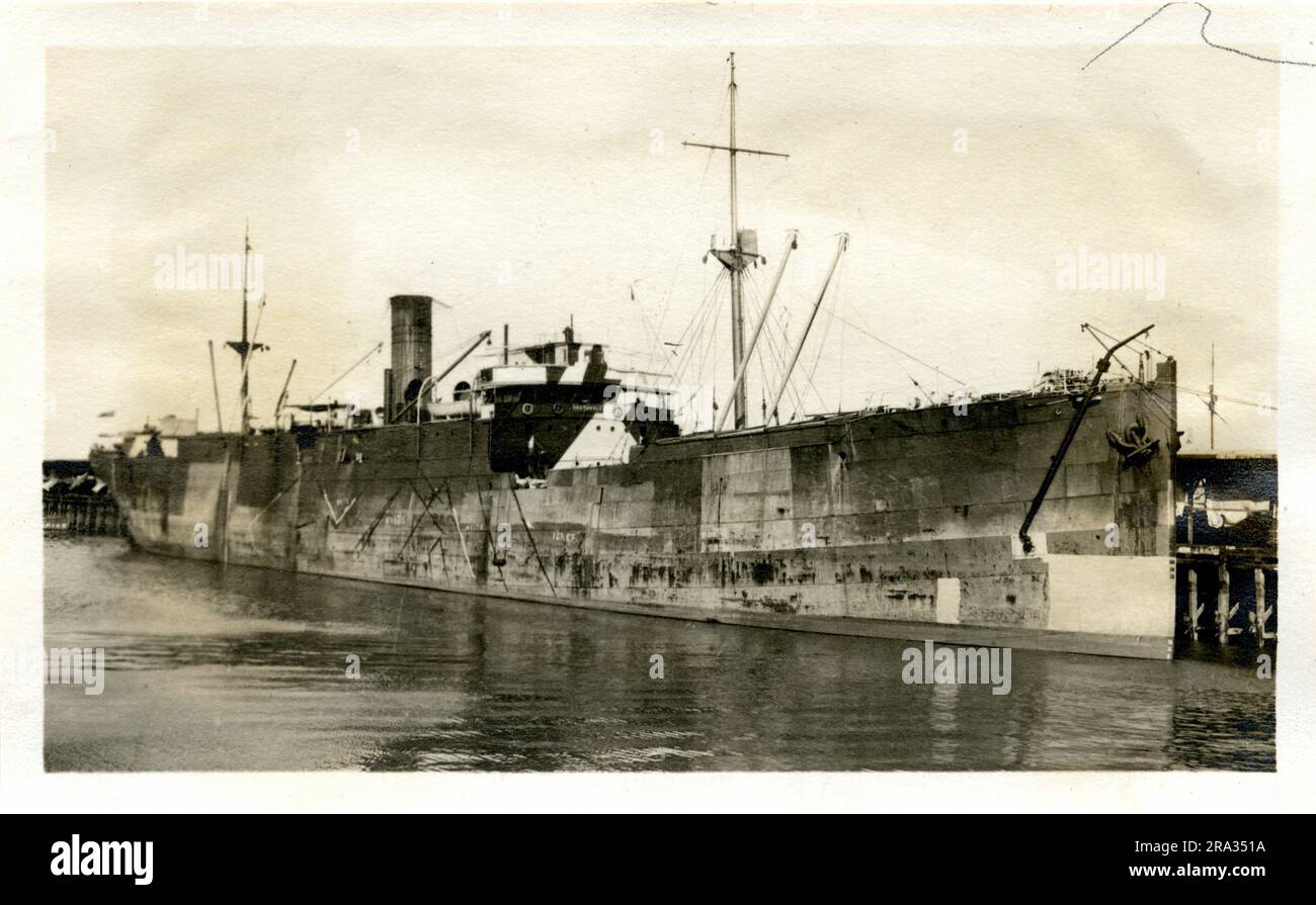 Photograph of the Starboard View of the SS Gretavale. Photograph Of Starboard View. May 18th., 1918. Photograph of S. S.; Gretavale: - Nationality; - British, Tonnage-5388. Captain;- James Morris. Owners; -Donaldson Line Ltd. Glasgoo Glasgow, Eng. Where from: - Manchester, Eng. Dest., Liverpool, England. Where photographed: - Savannah, Ga. Sixth Naval District. By whom photographed: - J. Boyd Dearborn. Date photographed: - May 11th., 1918. Started camouflage, Fore side of bridge finished, port & starboard not camouflaged. Where camouflaged: -England. Date camouflaged: - Could not remain long e Stock Photo