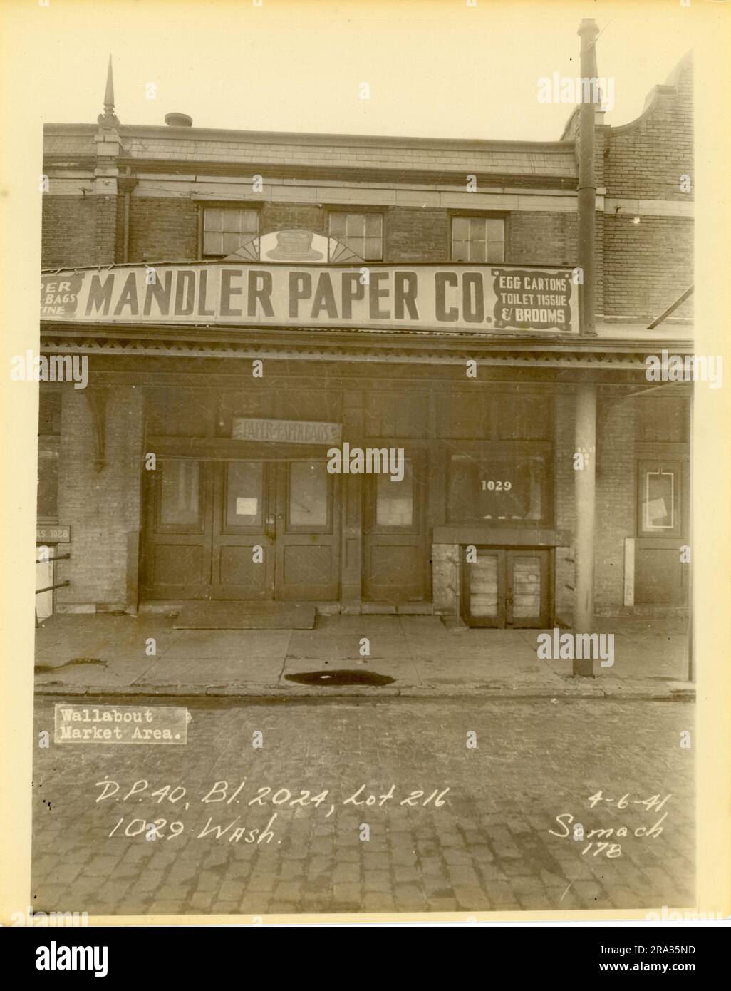 Photograph of exterior of lot 216, Bl. 2024, 1029 Wash.. Depicts