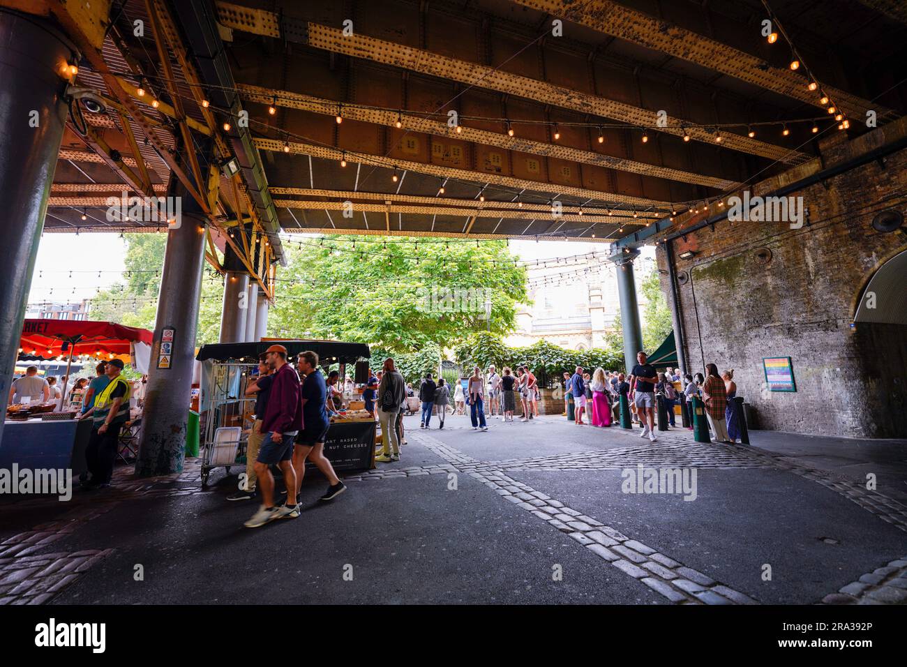 Borough Market in London, open air food market, farmers market with food stalls, street food, shops, food trucks and food to go, takeaway or eat-in. Stock Photo