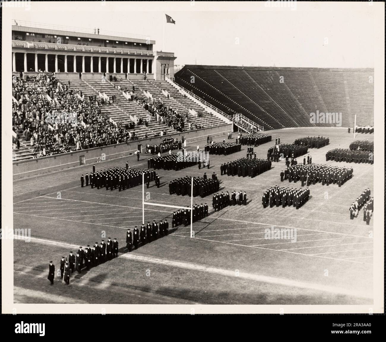 V-12 Regiment Prior to The Harvard-Tufts Game, Harvard Stadium, Boston, Massachusetts. Administrative History of the First Naval District in World War II Stock Photo