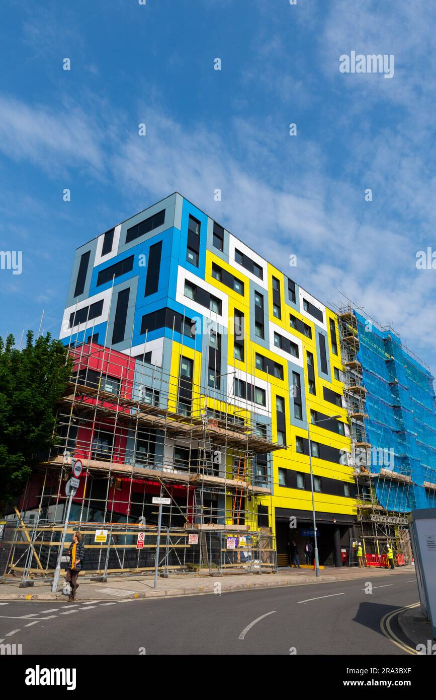 Work underway to replace the colourful cladding on the University of Essex student accommodation blocks in Southend on Sea. Deemed a fire risk Stock Photo