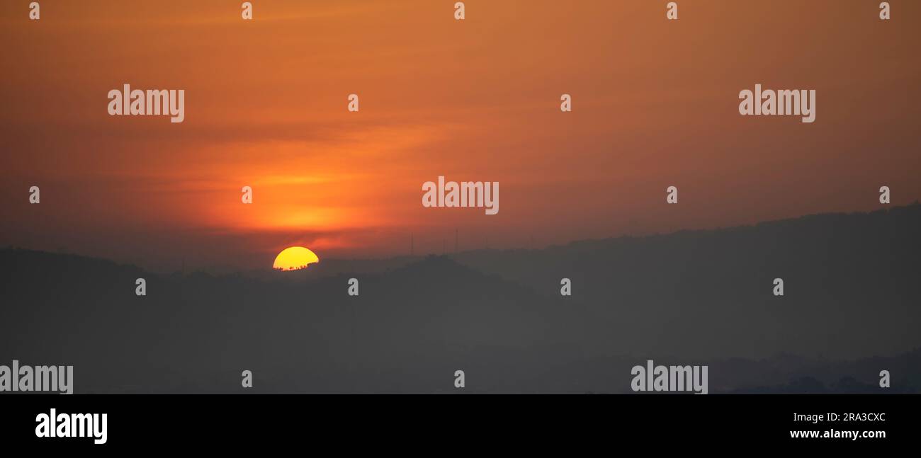 Beautiful sunset background in the mountains Stock Photo - Alamy