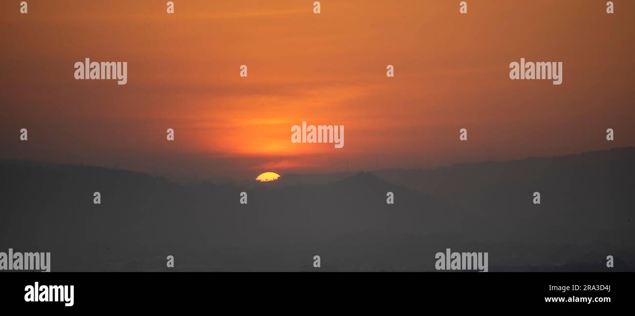 Beautiful sunset background in the mountains Stock Photo - Alamy