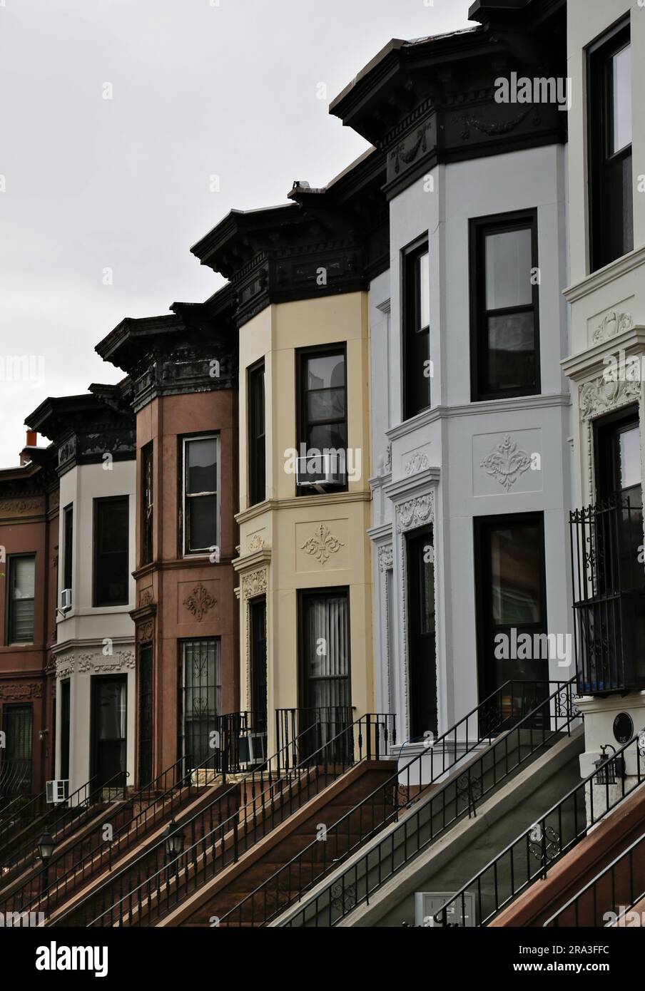 brownstones in brooklyn (colorful row houses with staircases and curved facades) real estate new