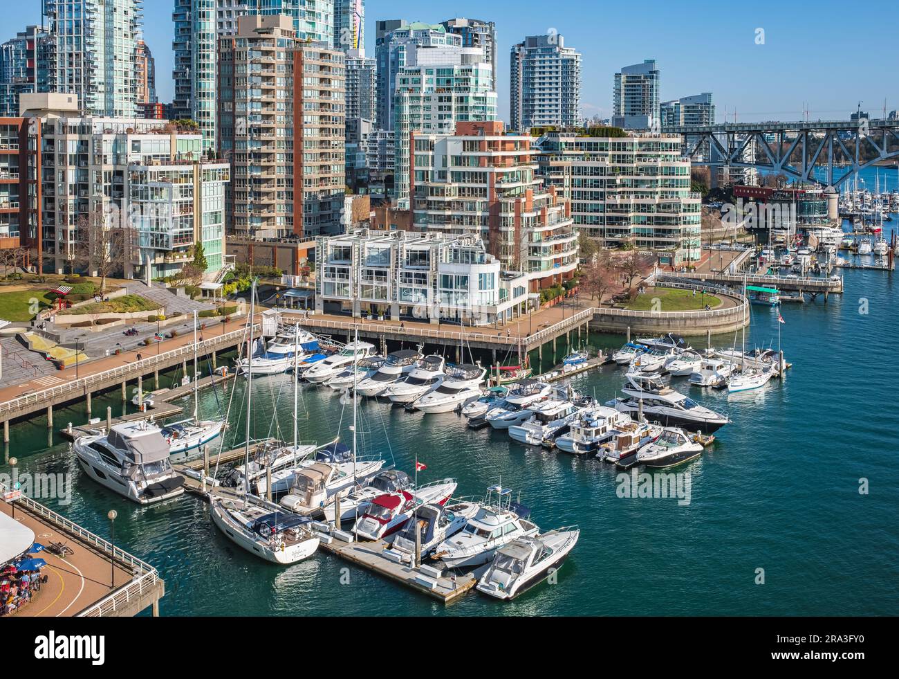 Panoramic aerial view of False creek in Vancouver in a sunny day, Canada. Boats and yachts at the Fisherman Wharf piers in False Creek marina close to Stock Photo