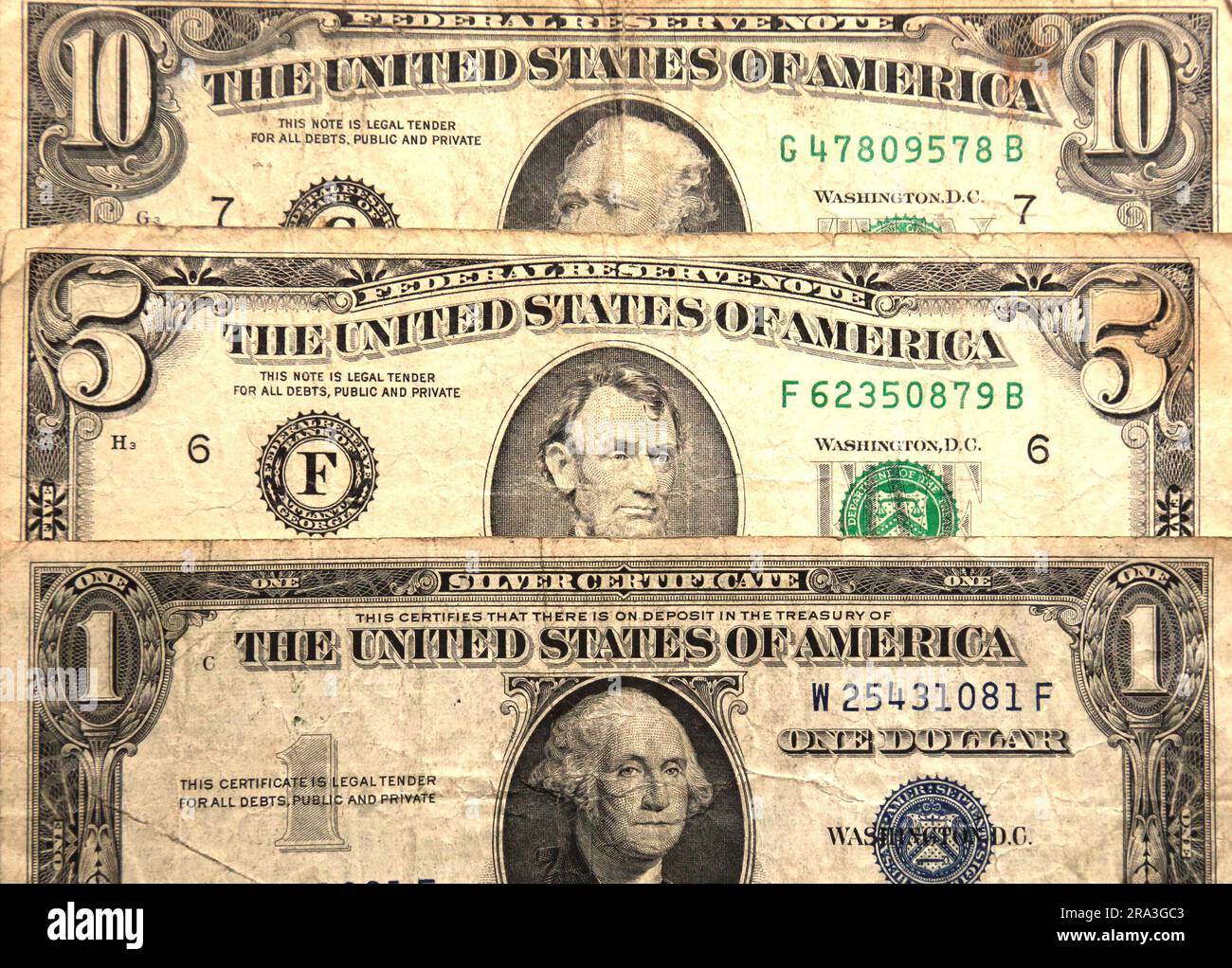 old us currency (1, 5, 10, one, five, ten) dollar dollars money vintage worn Stock Photo