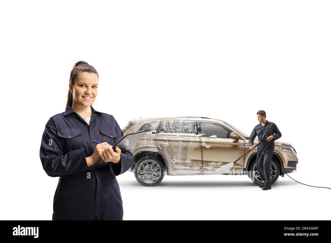Female carwash manager and a man washing a SUV with pressure washer