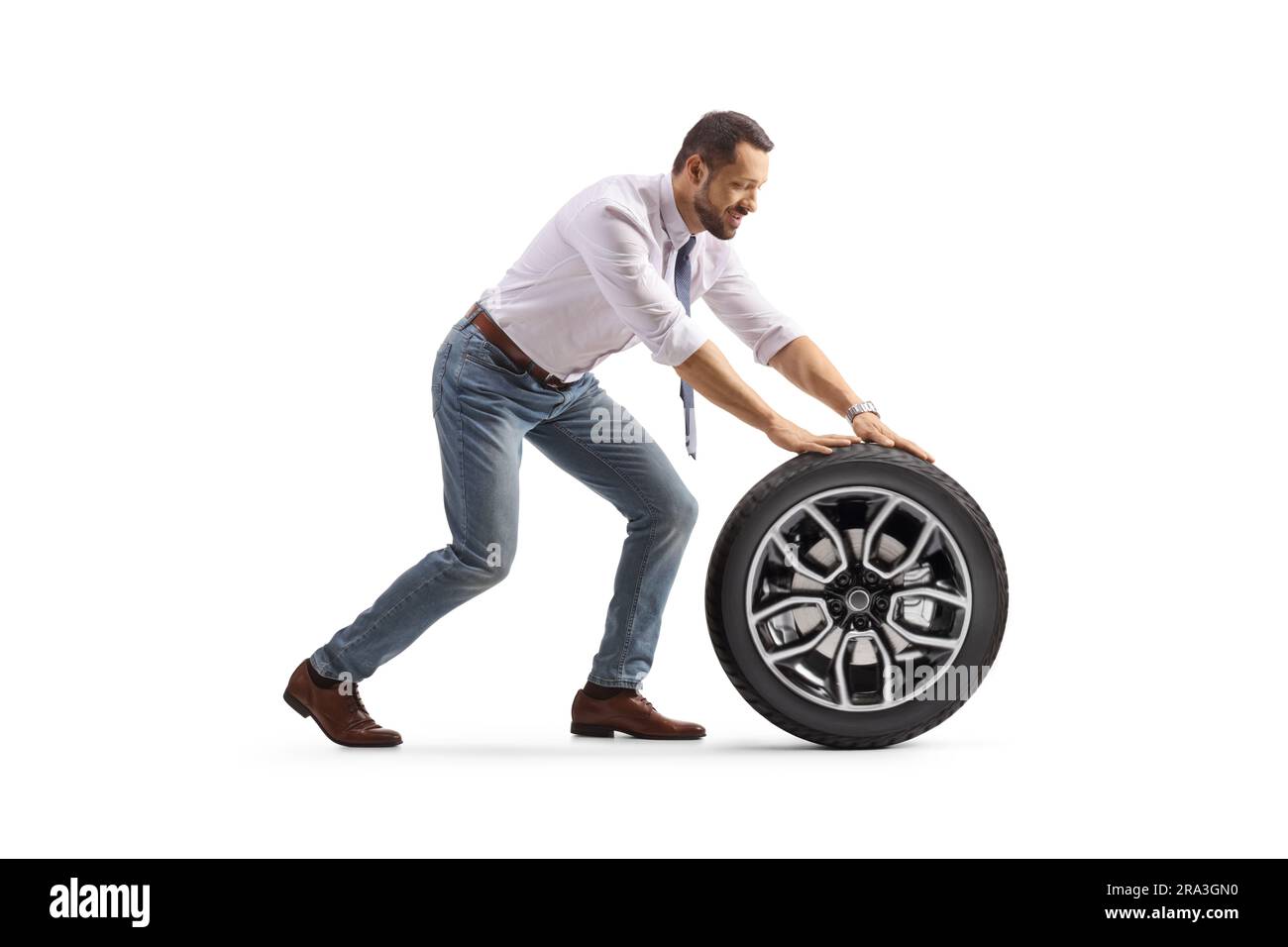 Guy Rolls Down Hill In Tire Towards Car