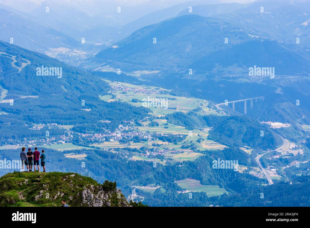 Innsbruck: view from Seegrube area of the Nordkette (Inntalkette) range of mountains to Innsbruck city, hiker, bridge Europabrücke of freeway Brennera Stock Photo