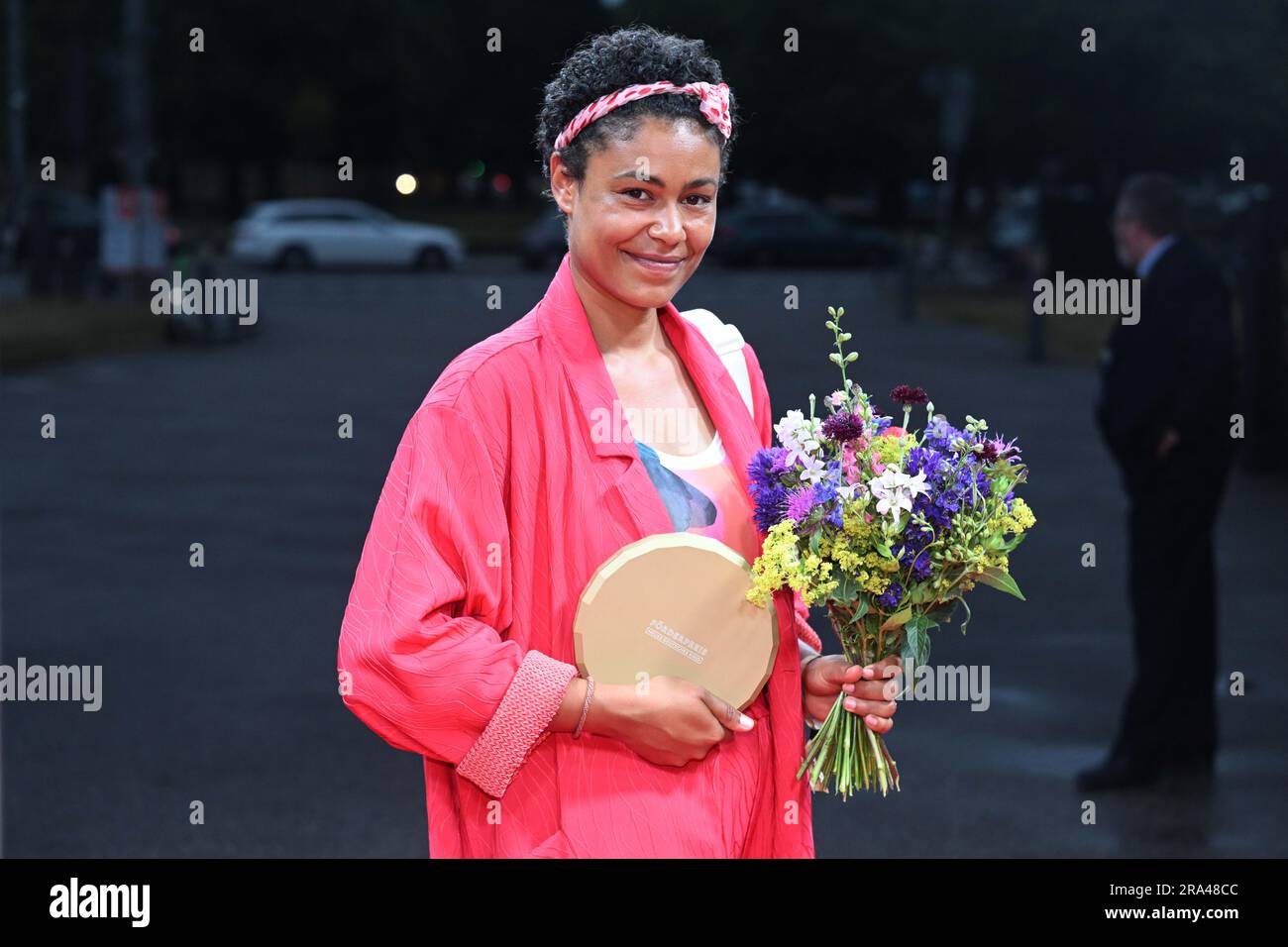 Munich, Germany. 30th June, 2023. The author Merle Grimme shows off her ...