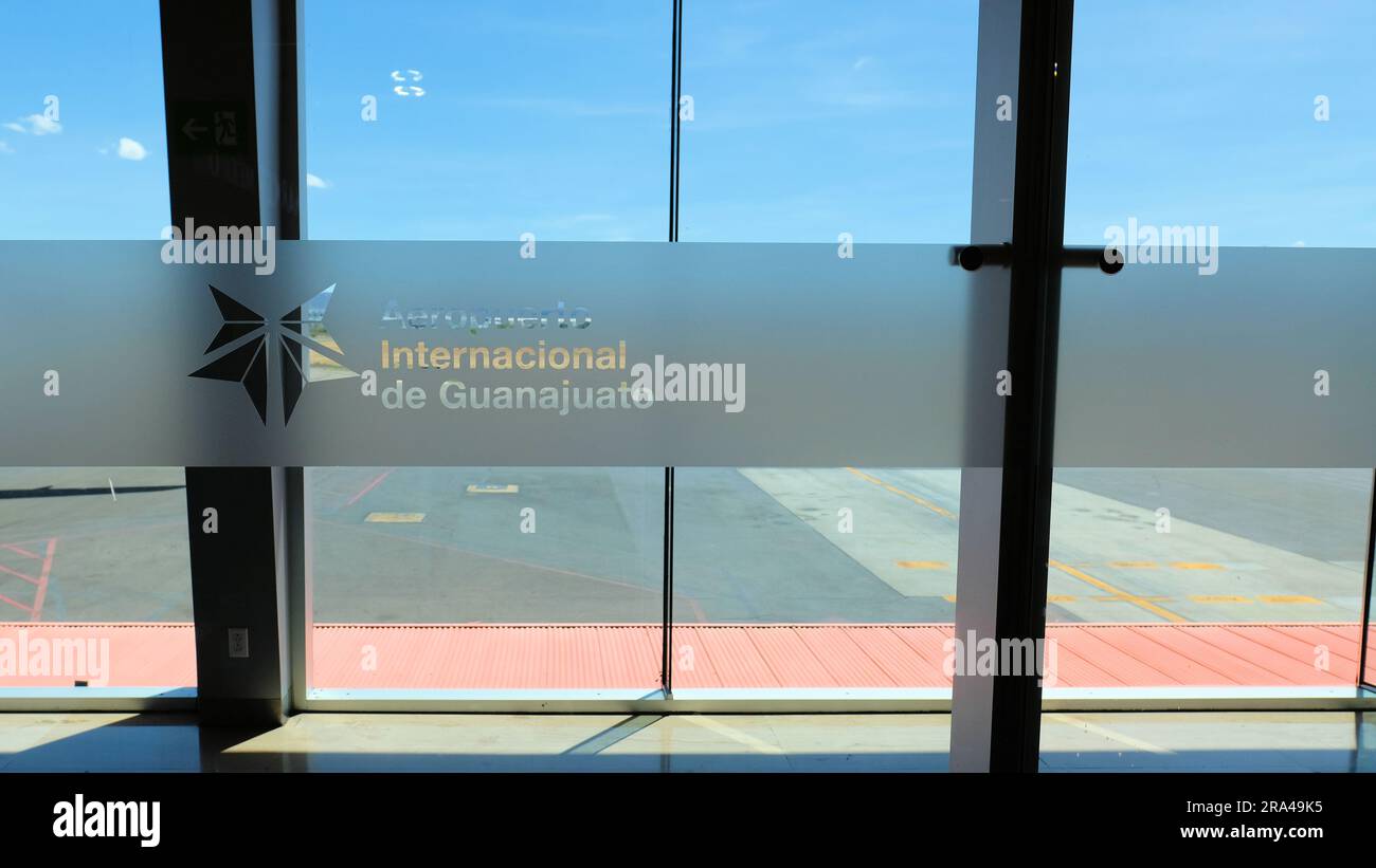 Glass etching with logo and name of Aeropuerto Internacional del Bajio, outside of Leon, Guanajuato in the town of Silao; Bajio International Airport. Stock Photo