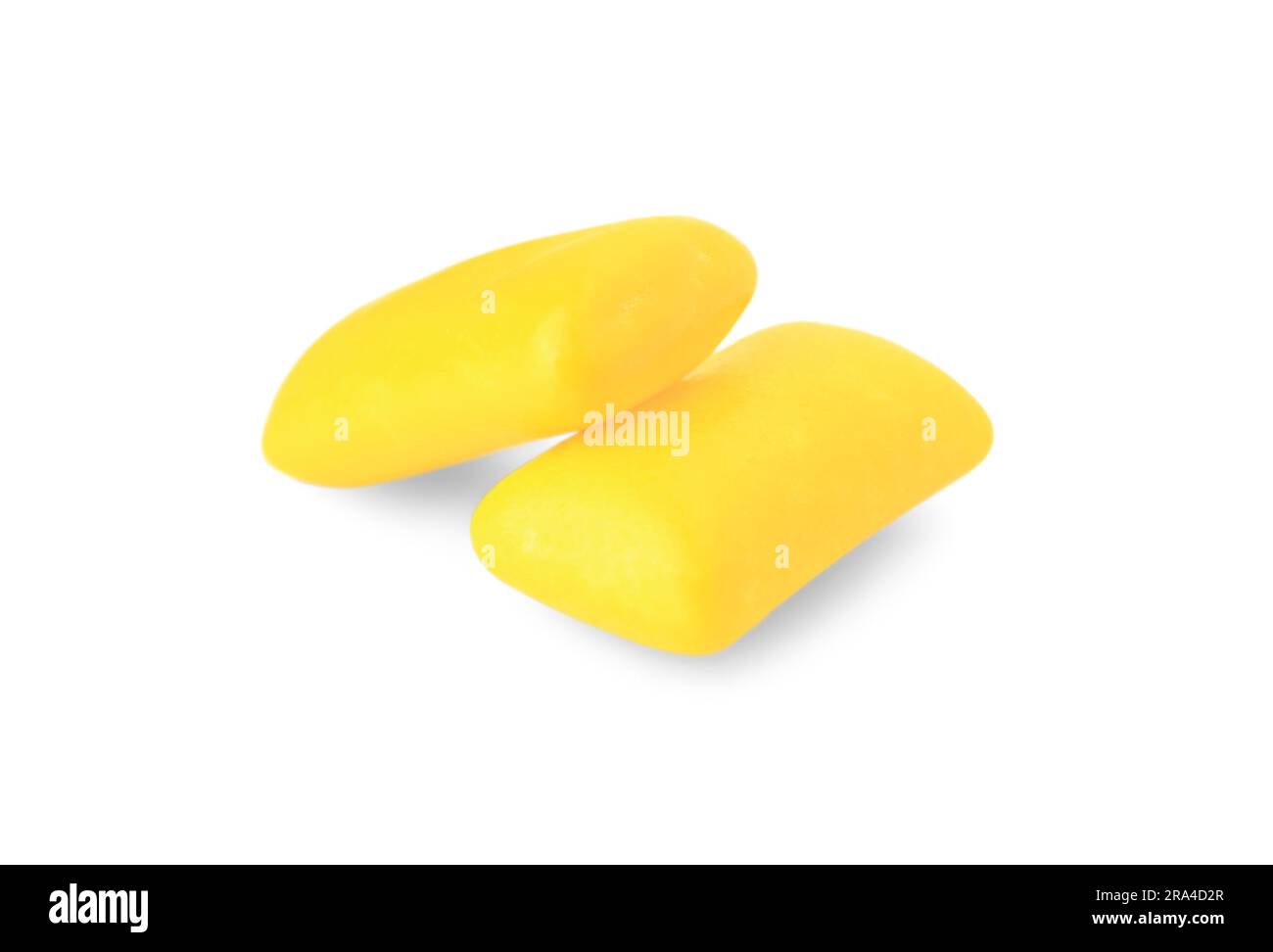 Tasty yellow chewing gums isolated on white Stock Photo Alamy
