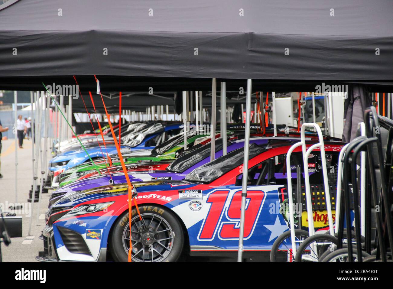 NASCAR race cars sit readied for the big event on June 30, 2023