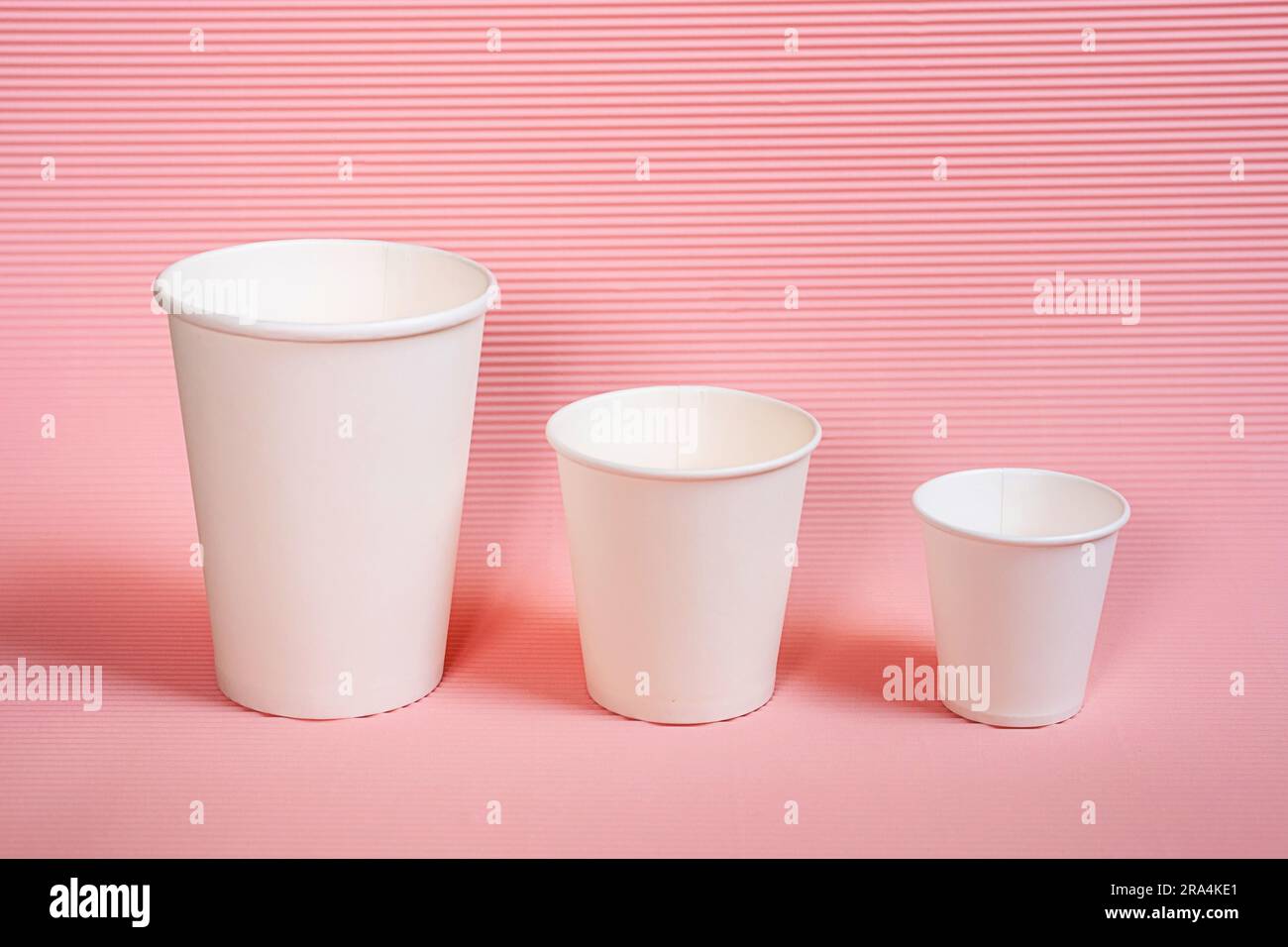 Various sized to go coffee cups. Stock Photo