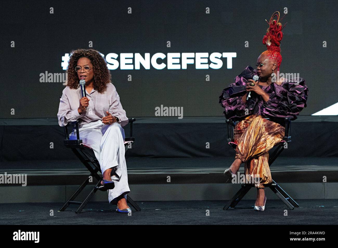 Oprah Winfrey, left, and Essence President and CEO Caroline Wanga