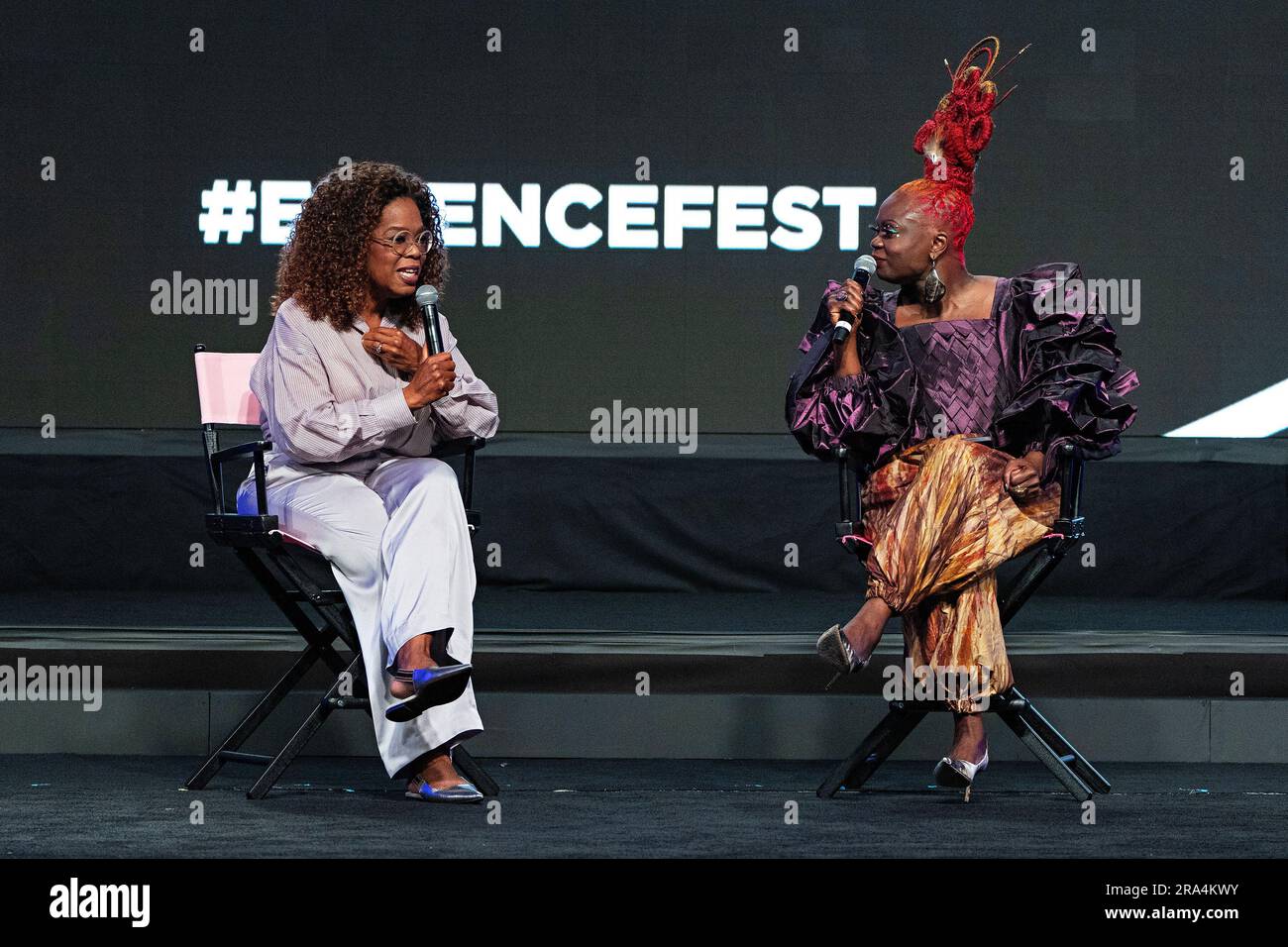 Oprah Winfrey, left, and Essence President and CEO Caroline Wanga