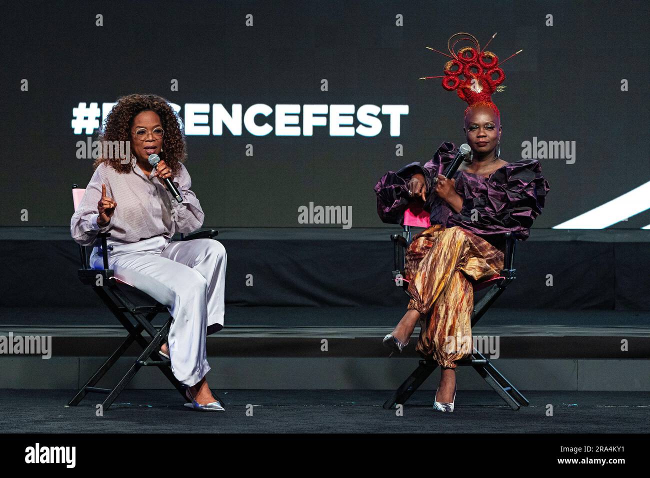 Oprah Winfrey, left, and Essence President and CEO Caroline Wanga