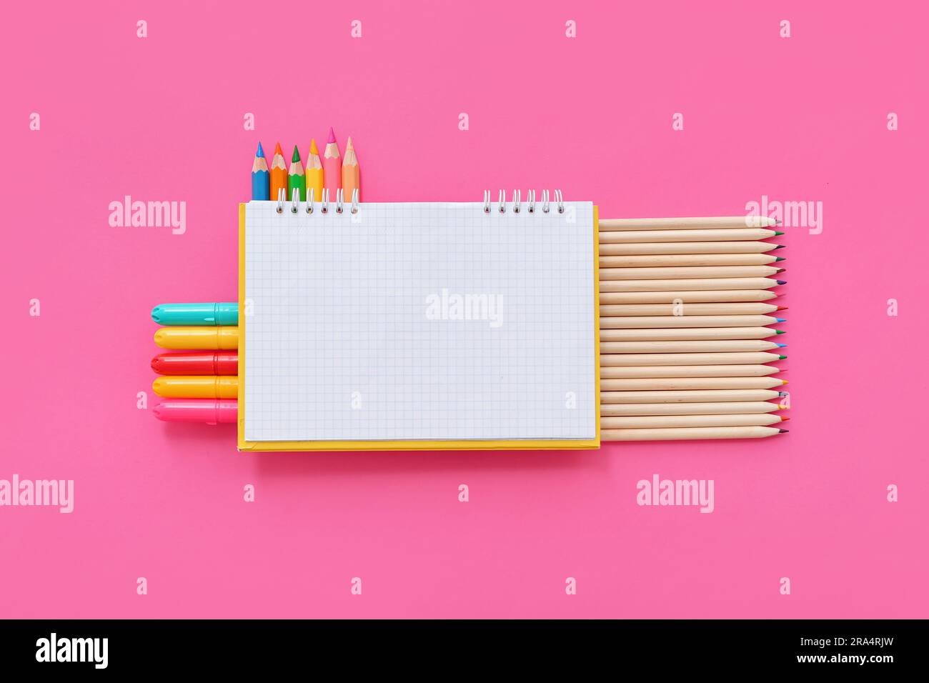 Yellow, Orange, Pink, and Blue Coloring Pens on White Notebook · Free Stock  Photo