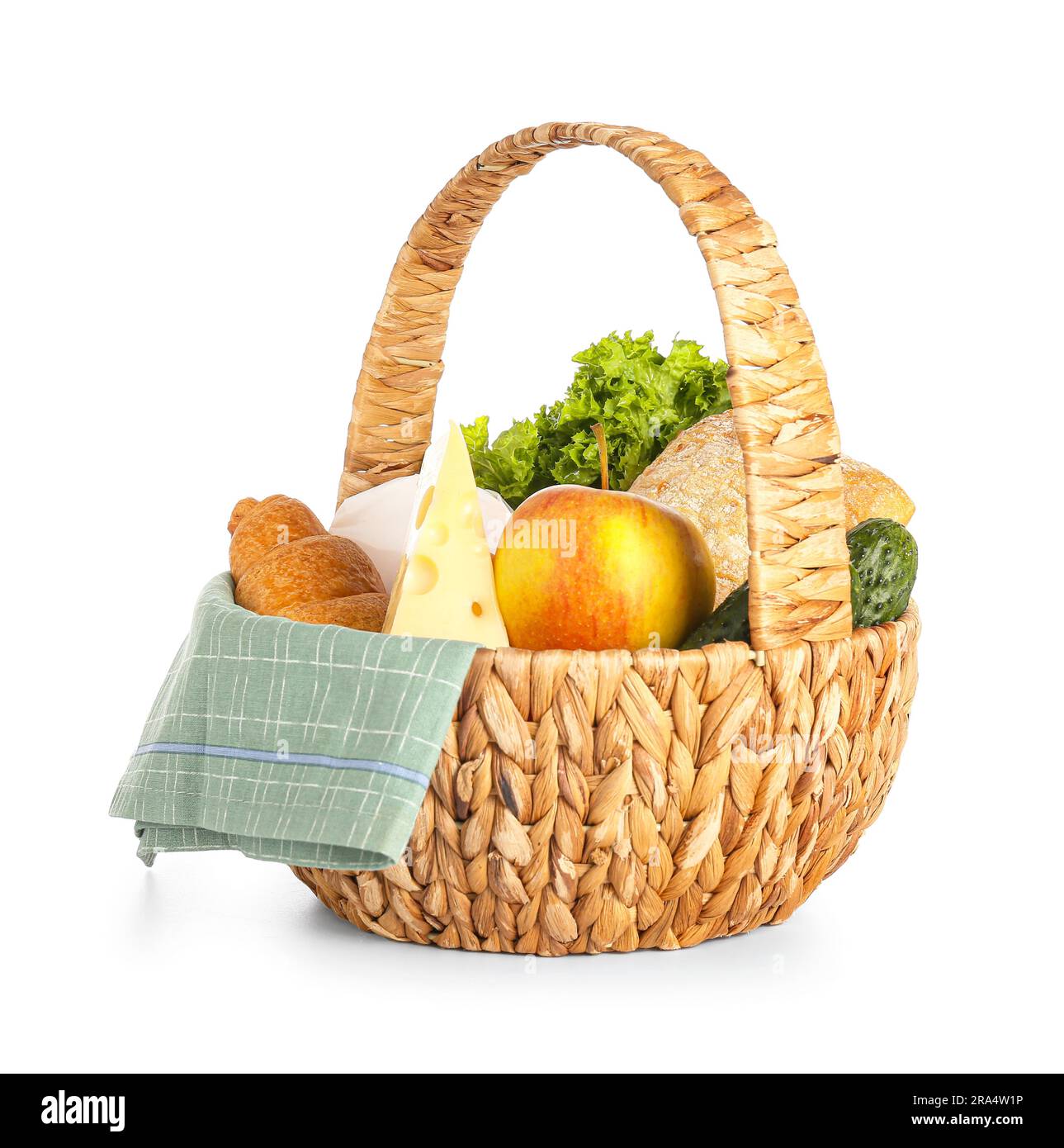 Wicker basket with delicious food for picnic on white background Stock ...