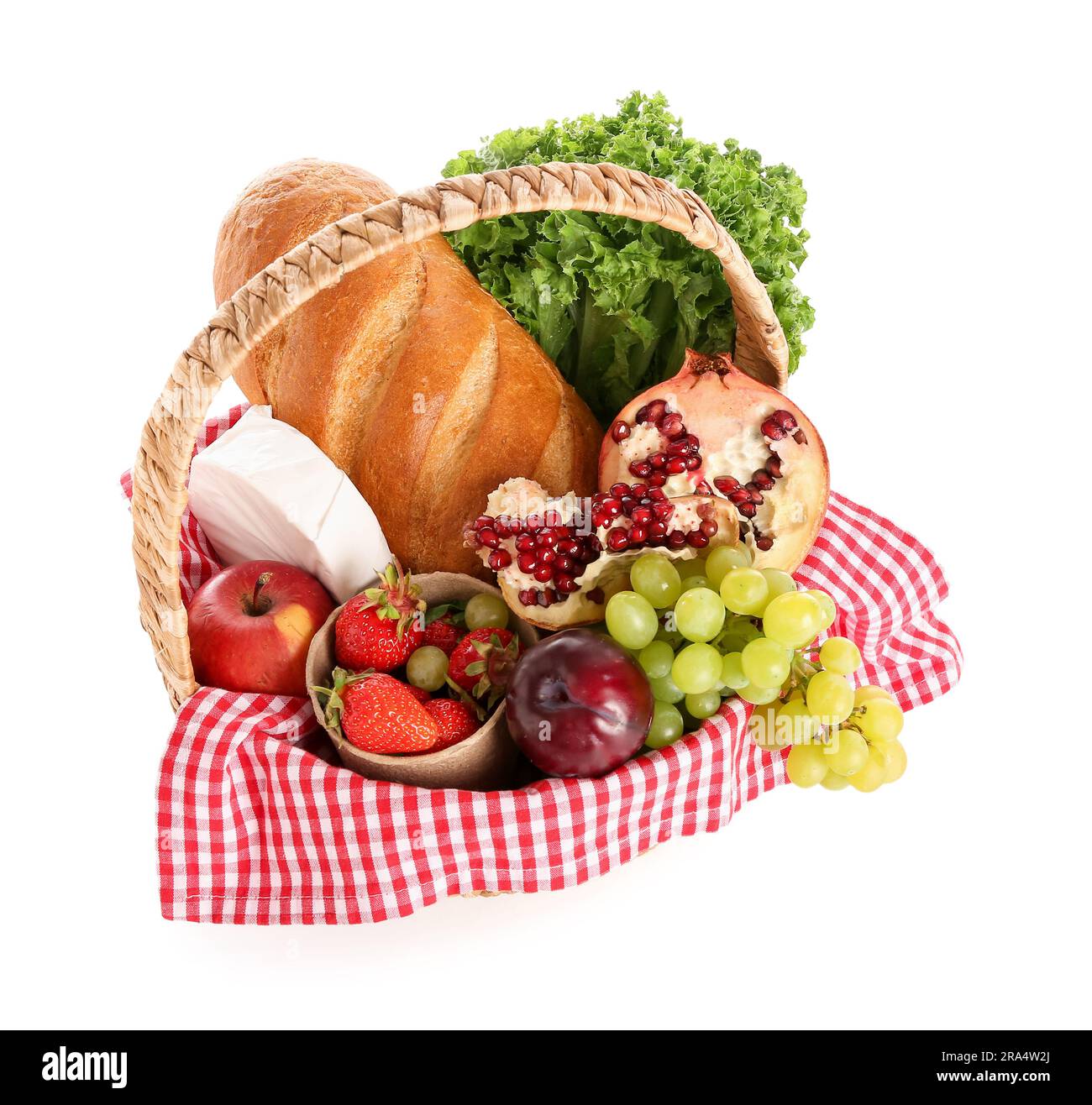 Wicker basket with delicious food for picnic on white background Stock ...