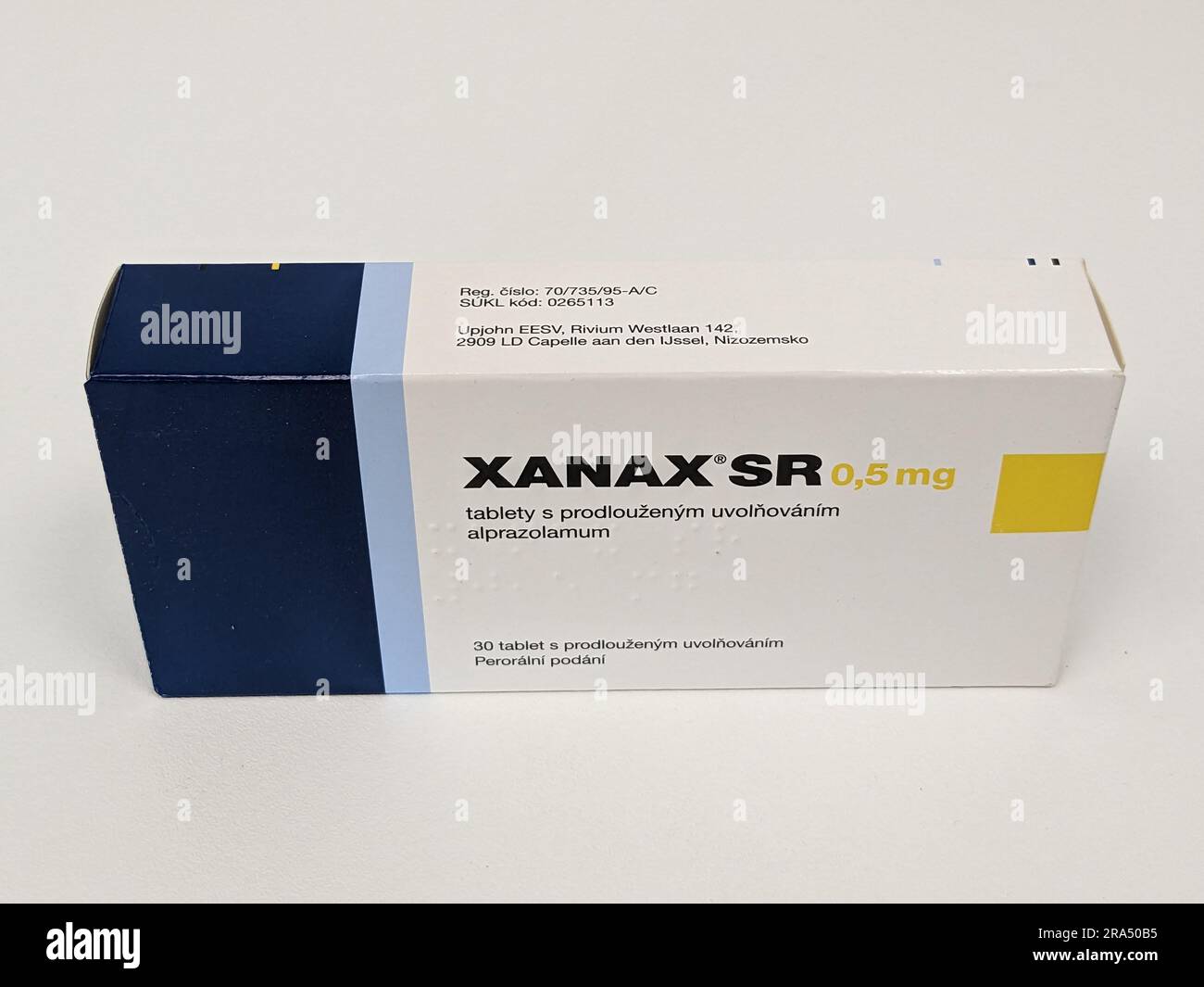 Xanax pills with active substance Alprazolam,anxiolytic anti-depressant medication therapy drugs,is popular drug to abuse and has street value Pfizer Stock Photo
