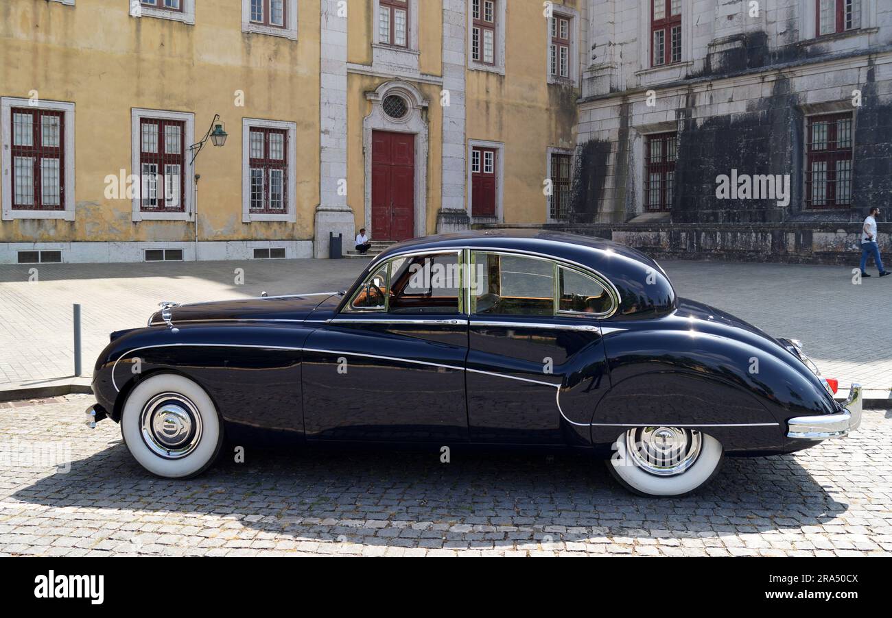 Jaguar Mark IX, dark blue four-door luxury saloon car, produced between 1958 and 1961, seen in Mafra, Portugal Stock Photo