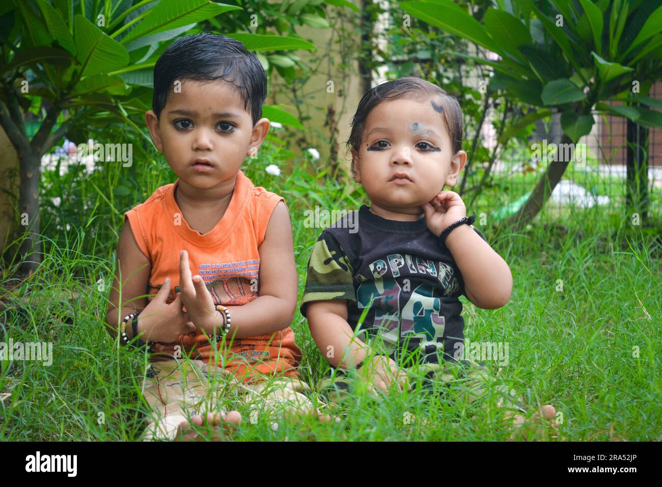 TIKAMGARH, MADHYA PRADESH, INDIA - AUGUST 13, 2022: Boy and girl playing in park. Stock Photo