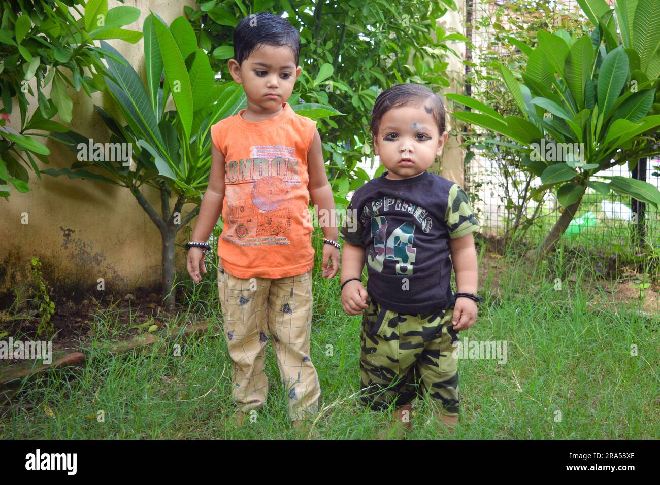 TIKAMGARH, MADHYA PRADESH, INDIA - AUGUST 13, 2022: Boy and girl playing in park. Stock Photo