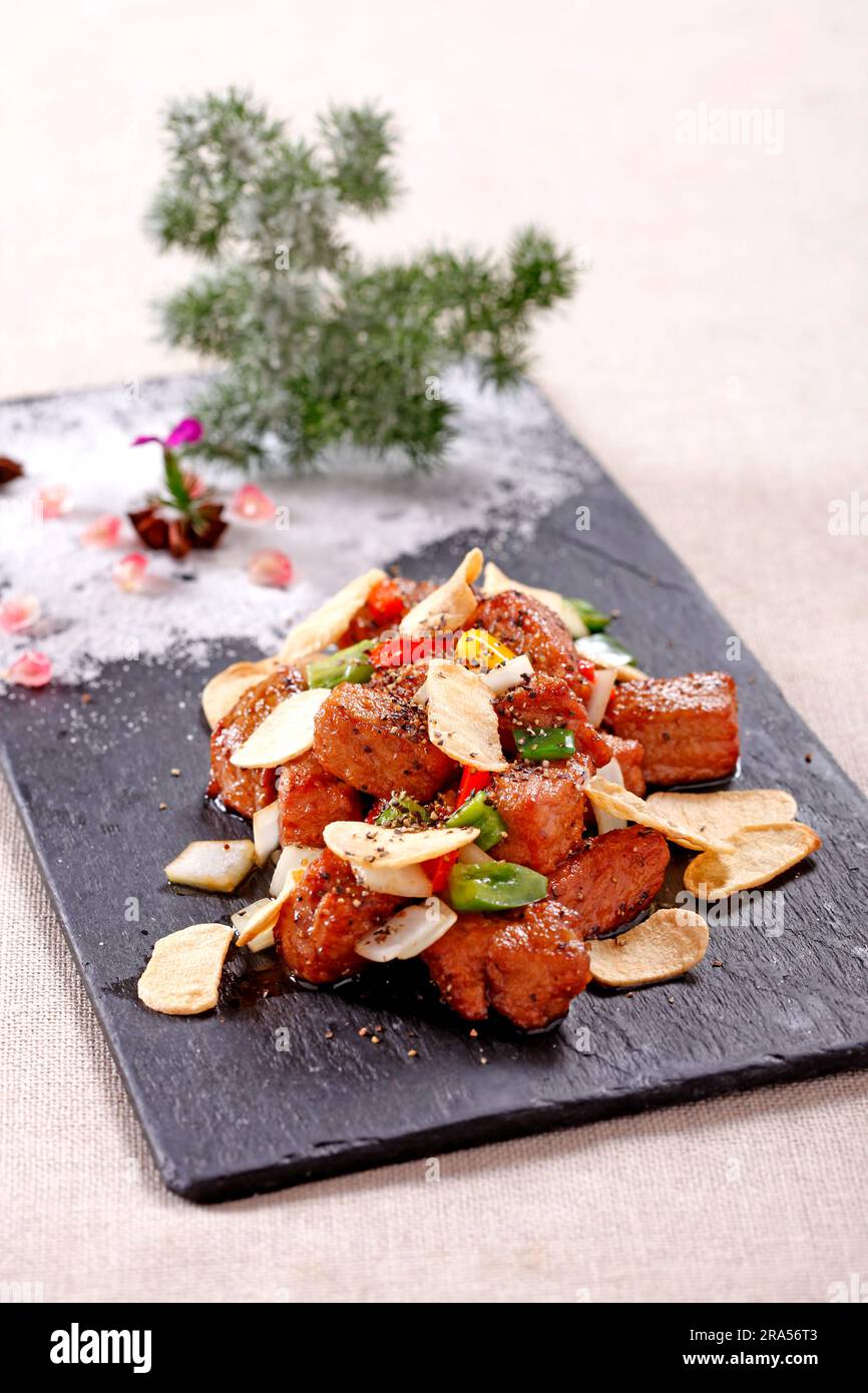 Panfried Beef Ribs cube with garlic Stock Photo Alamy