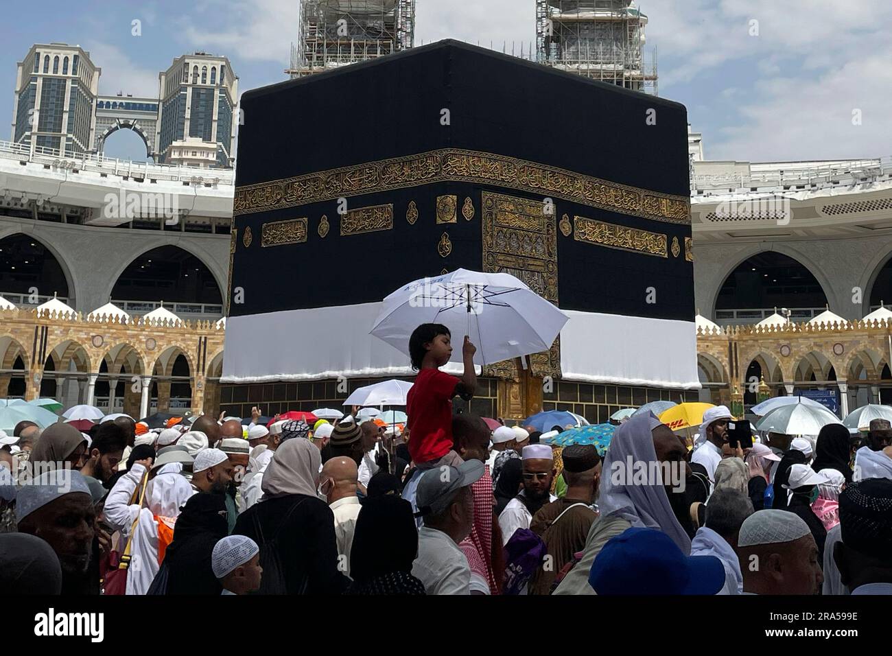 Muslim Pilgrims Circumambulate The Kaaba The Cubic Building At The 