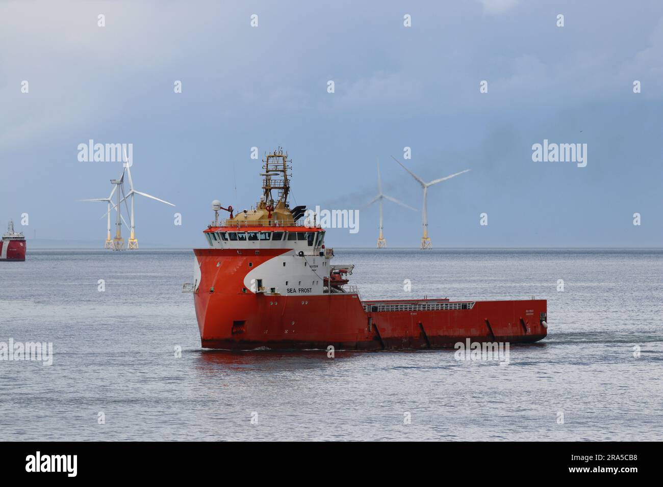 Boats and wind turbines Stock Photo Alamy