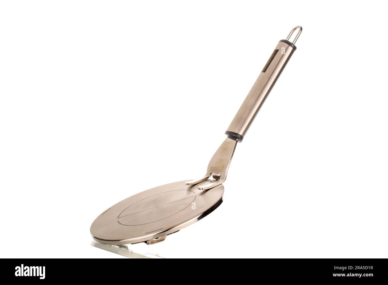 One metal adapter with handle for induction surface, macro, isolated on