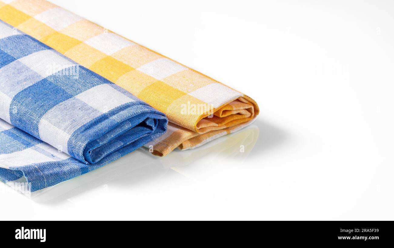 https://c8.alamy.com/comp/2RA5F39/kitchen-napkins-in-blue-and-yellow-checkered-on-a-white-background-2RA5F39.jpg