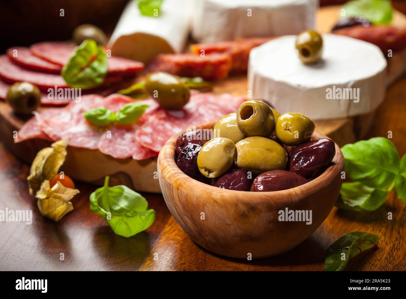 Fresh olives and antipasto catering platter Stock Photo