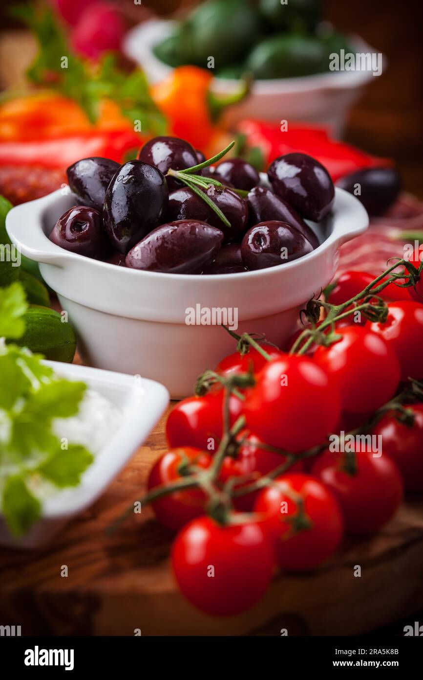 Raw vegetables, yogurt dip and antipasti Stock Photo Alamy
