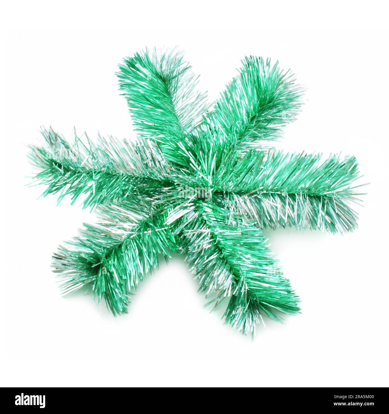 Green sparkle snowflake isolated on a white background Stock Photo