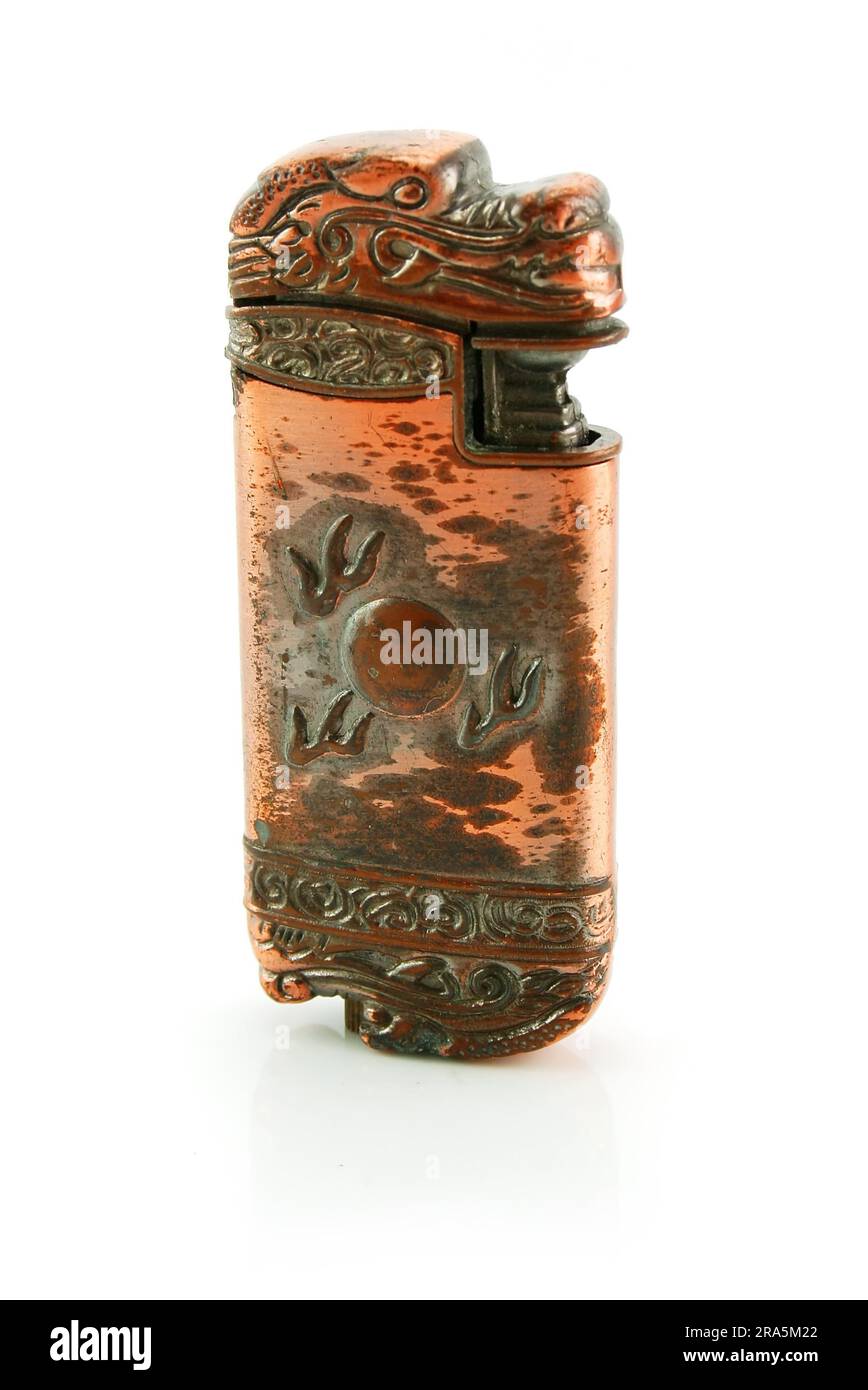 Old bronze gas lighter isolated on a white background Stock Photo Alamy