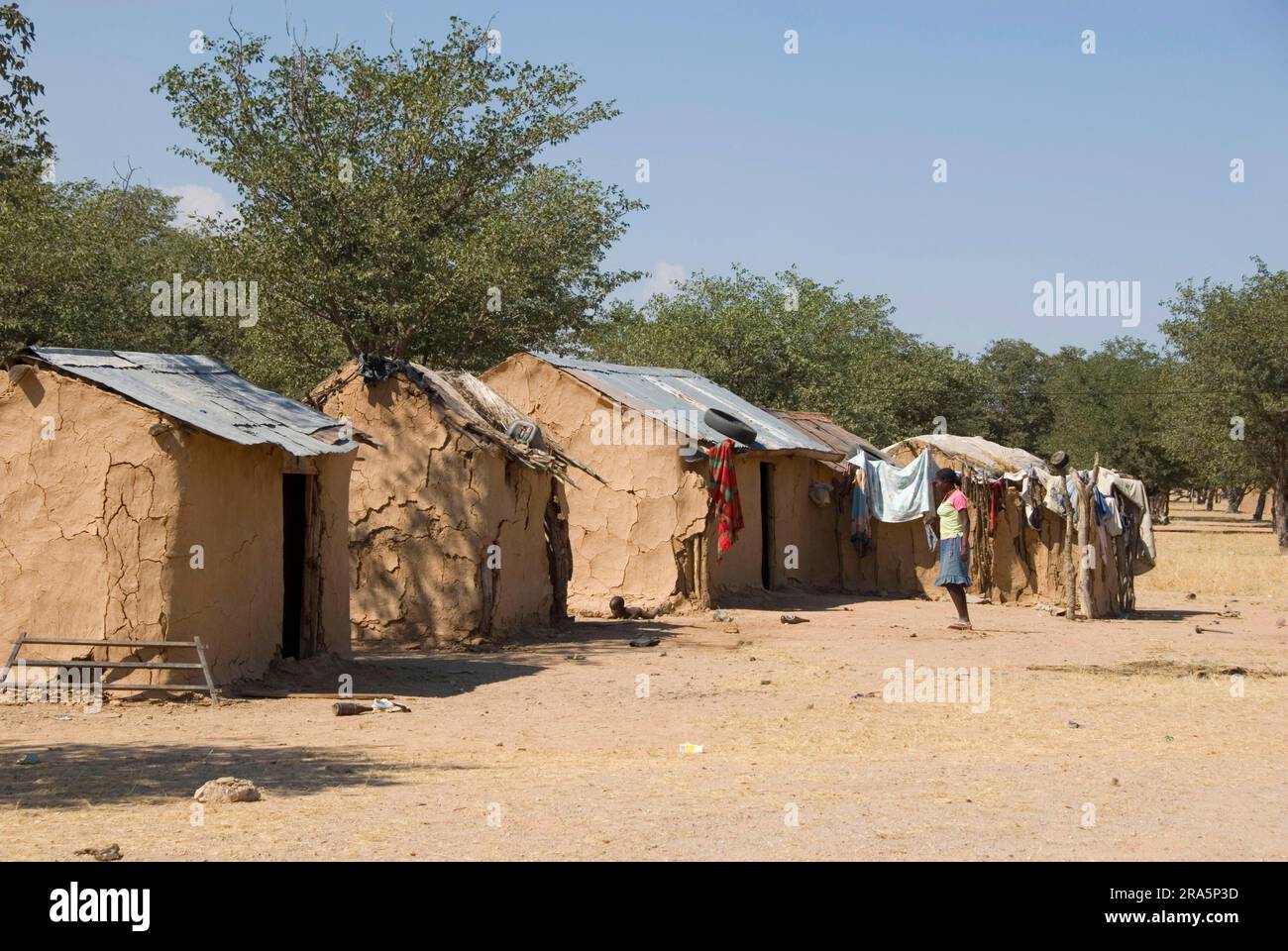 Mud huts, Warm spring, Kaokoveld, Namibia Stock Photo