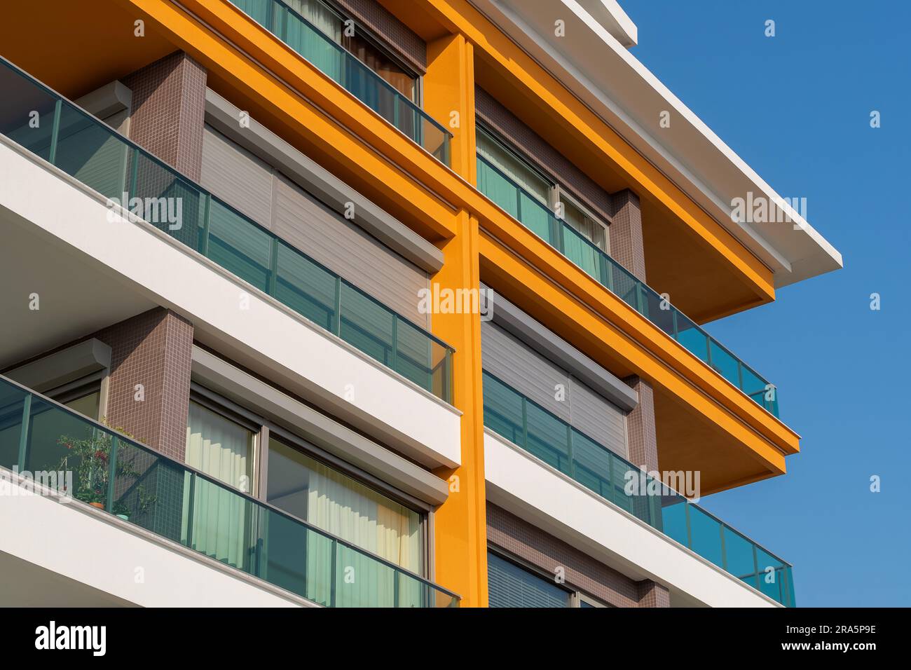 Photo inspiration: Visual Reference: New Apartment Building With Large Balconies With Glass Railings Modern