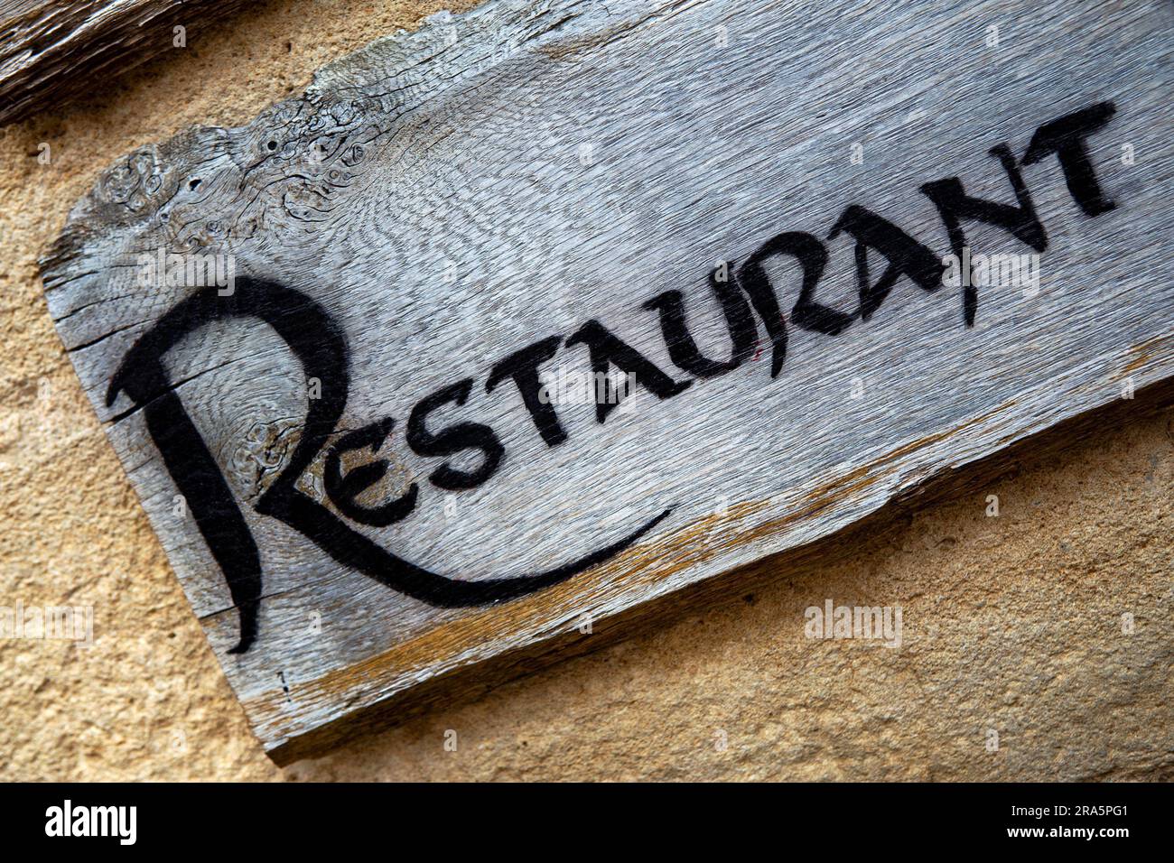 Restaurant sign in a French village Stock Photo - Alamy