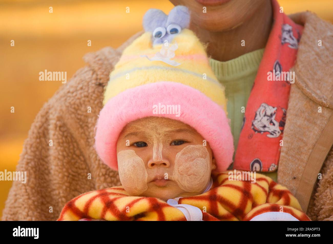 Burmese baby with thanaka paste on face, Bagan, Burma, Pagan, Myanmar