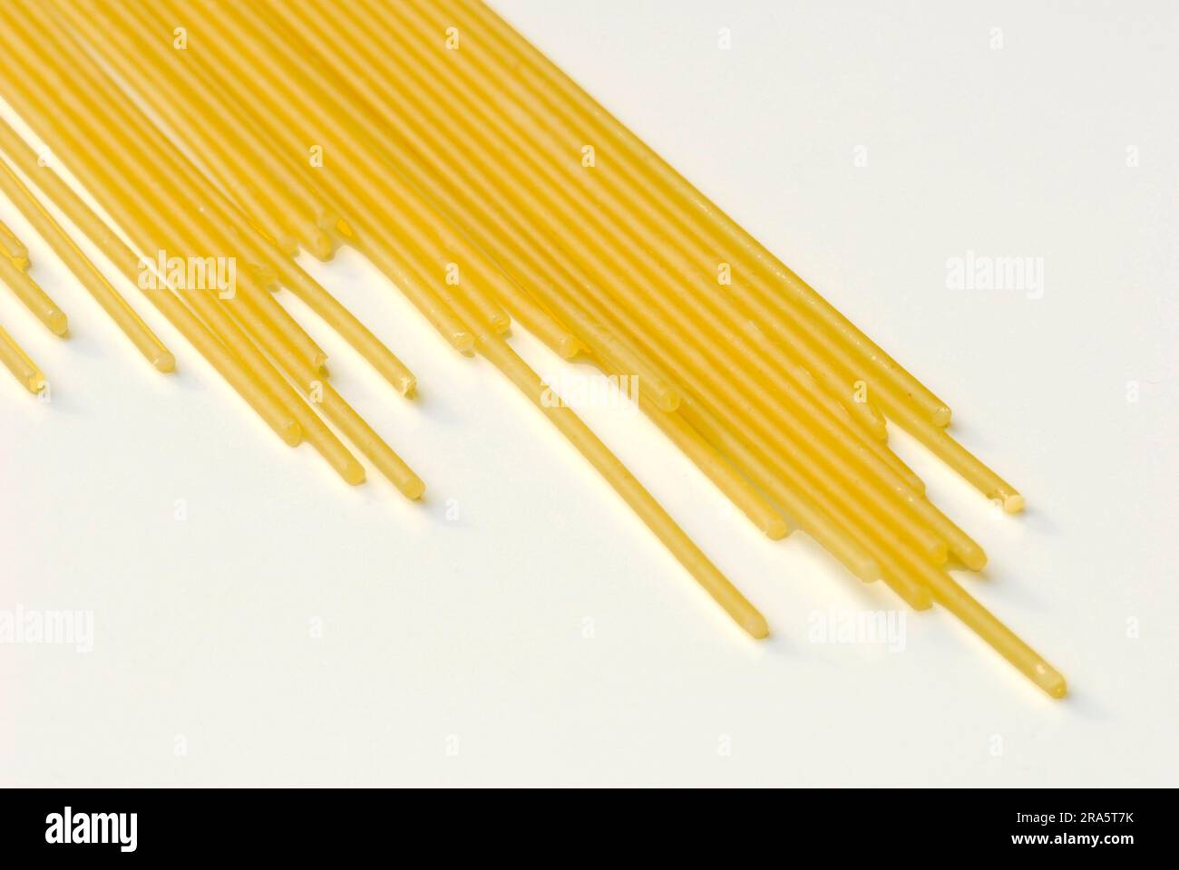 Spaghettis, uncooked, raw Stock Photo Alamy