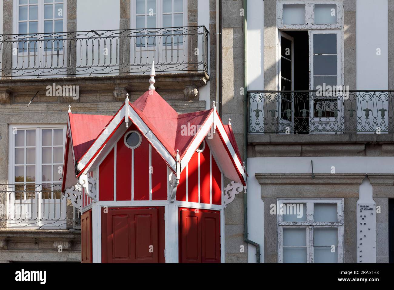 Historic wooden kiosk, painted red, hexagonal plan, replica based on the 1930 model, Quiosque da Ramadinha, Porto, Portugal Stock Photo